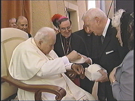Joe and Ann Brennan receiving Zucchetto from Pope John Paul II